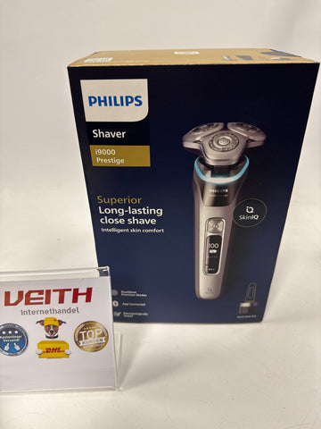 Philips Rasierer i9000 Prestige, Nass- und Trockenrasierer für Männer mit integriertem Trimmer, grau-silber, Drucksensor, Reinigungsstation, Ladestation und Reiseetui (Modell XP9205/30)