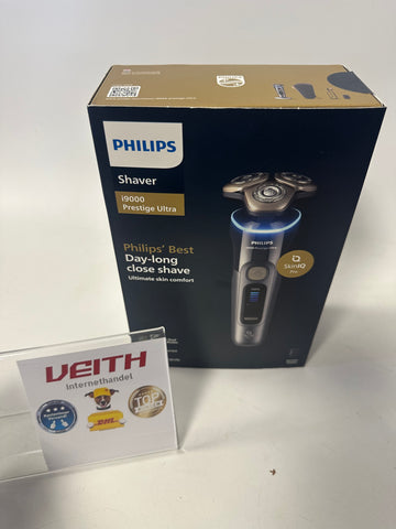 Philips Rasierer i9000 Prestige Ultra, Nass- und Trockenrasierer für Männer, dunkelgrau, Druck- und Bewegungssensor, Trimmeraufsatz, Ladestation und Reiseetui (Modell XP9402/11)